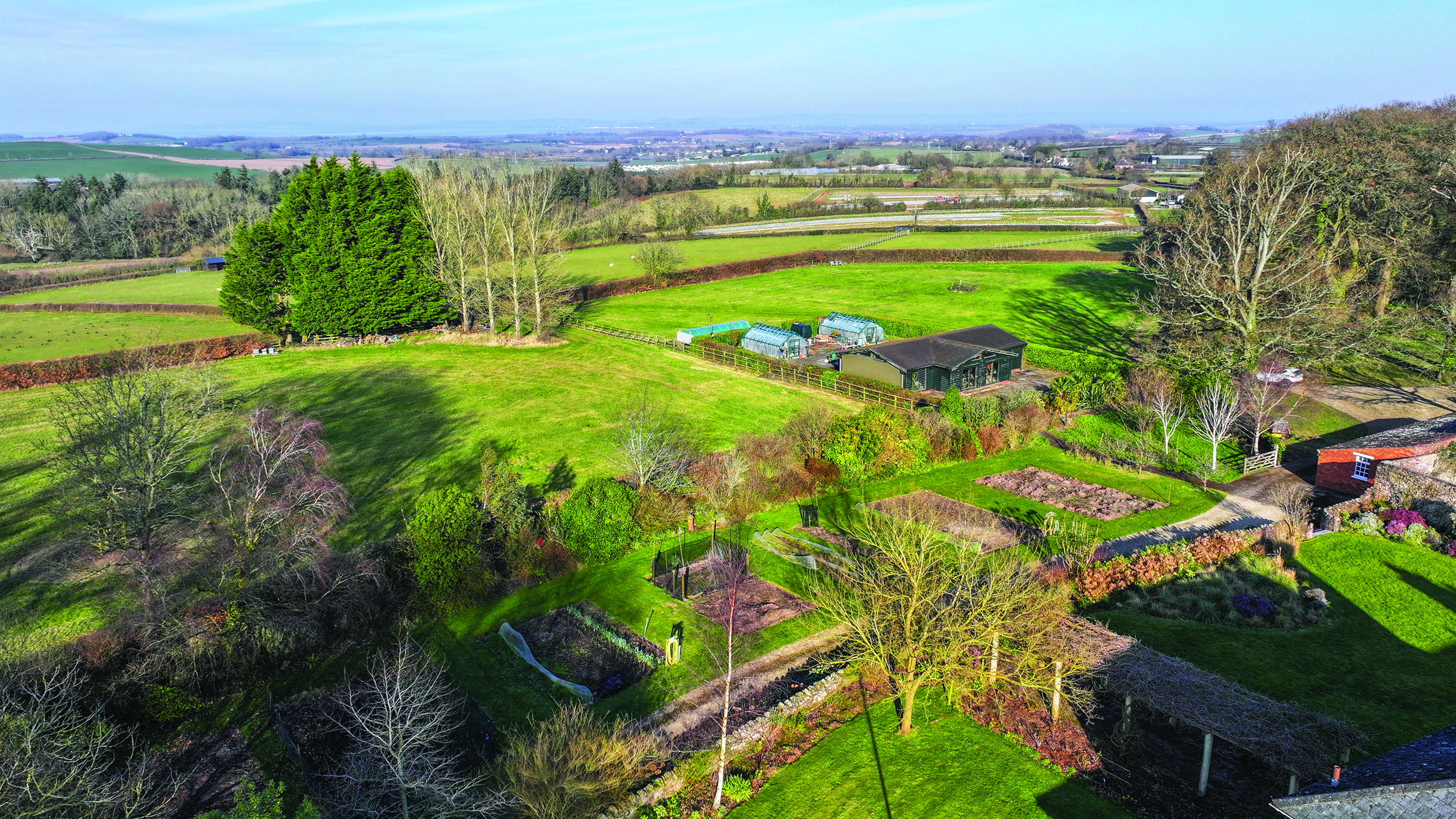 View of the gardens of Park House, Over Stowey, Bridgwater, Somerset.