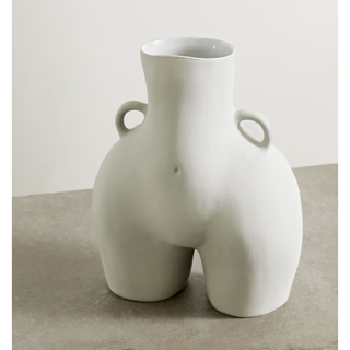 ceramic vase in the shape of the female form
