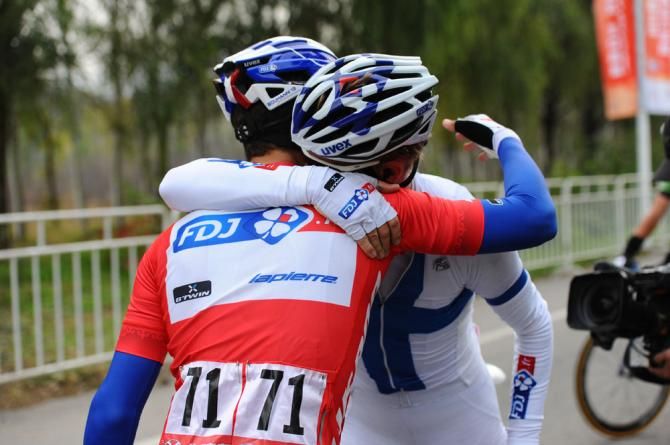 Bouhanni celebrates with his team