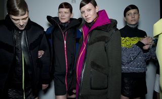 3 Models wearing jackets with winter jumpers