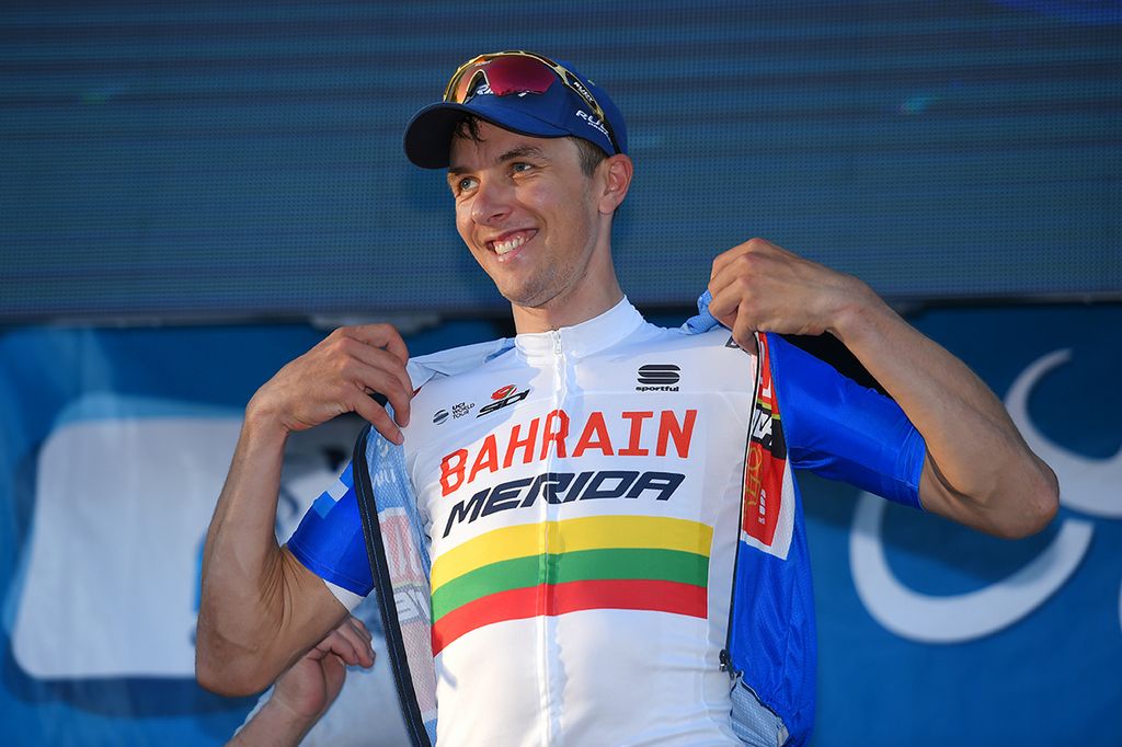 Ramunas Navardauskas pulls on the leader's jersey