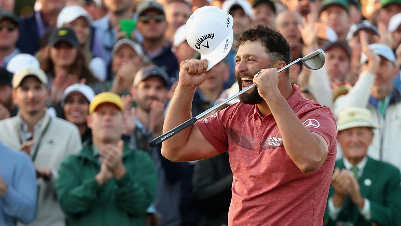 Jon Rahm celebrates holing the winning putt at the 2023 Masters