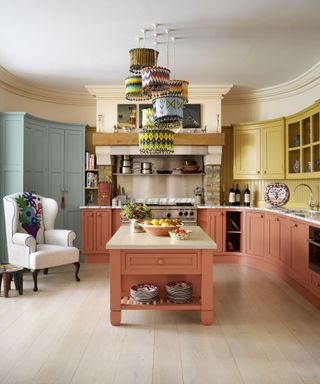 Colorful kitchen with patterned beaded lampshades in Kit Kemp's house