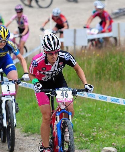 Lea Davison climbs