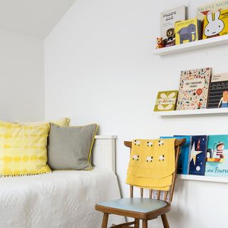 white kids room with book storage