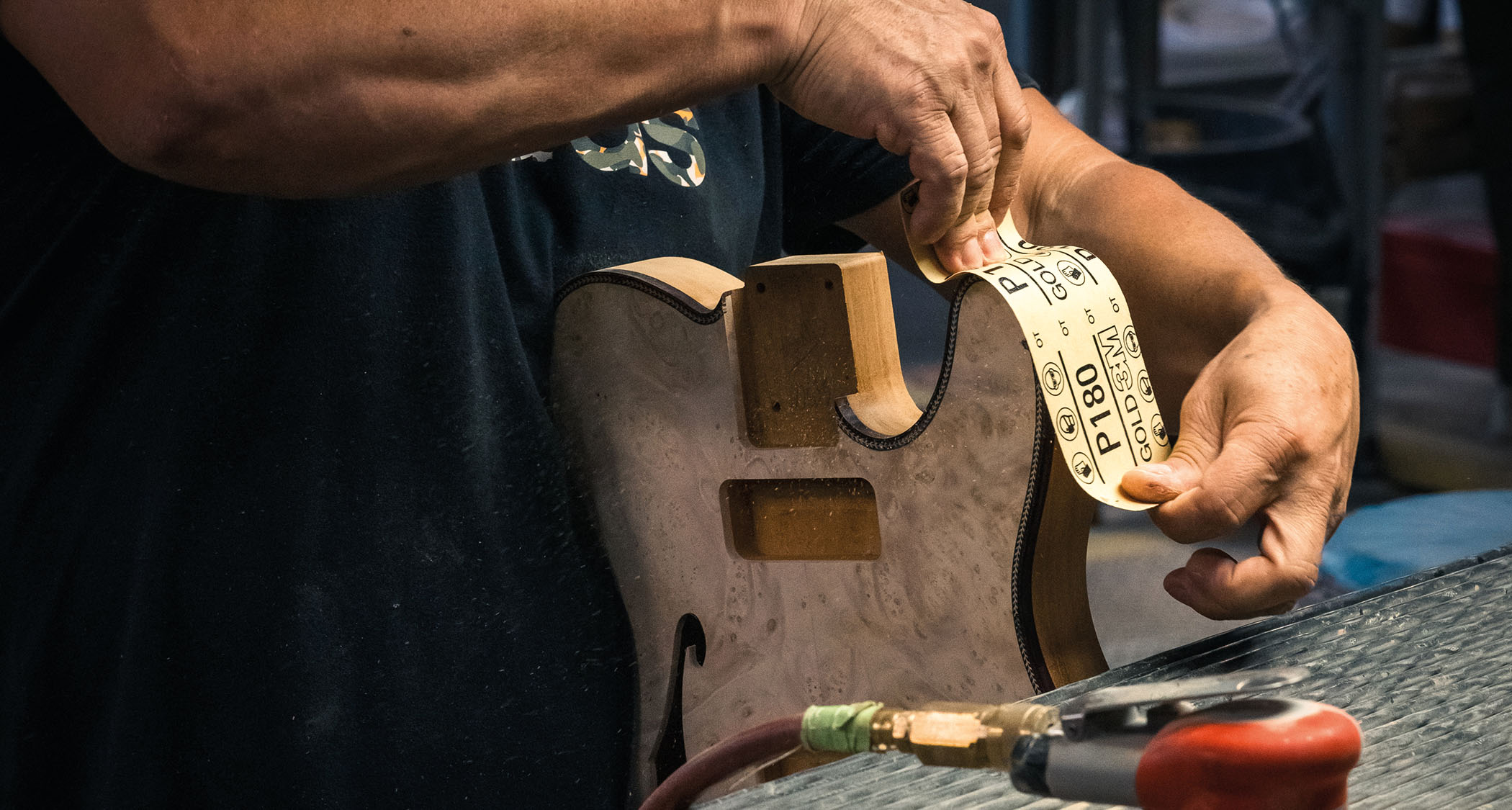 A luthier at the Fender Custom Shop puts together a high-end Telecaster