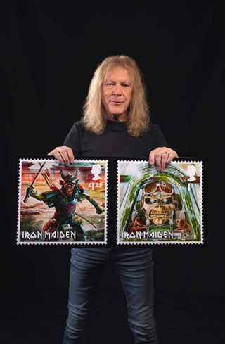 Janick Gers holding a stamp mockup