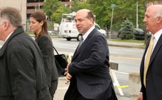 Samuel Israel III, center, arrives at U.S. District Court in UNITED STATES