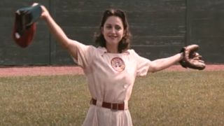 Madonna stands proudly after a catch in A League of Their Own.