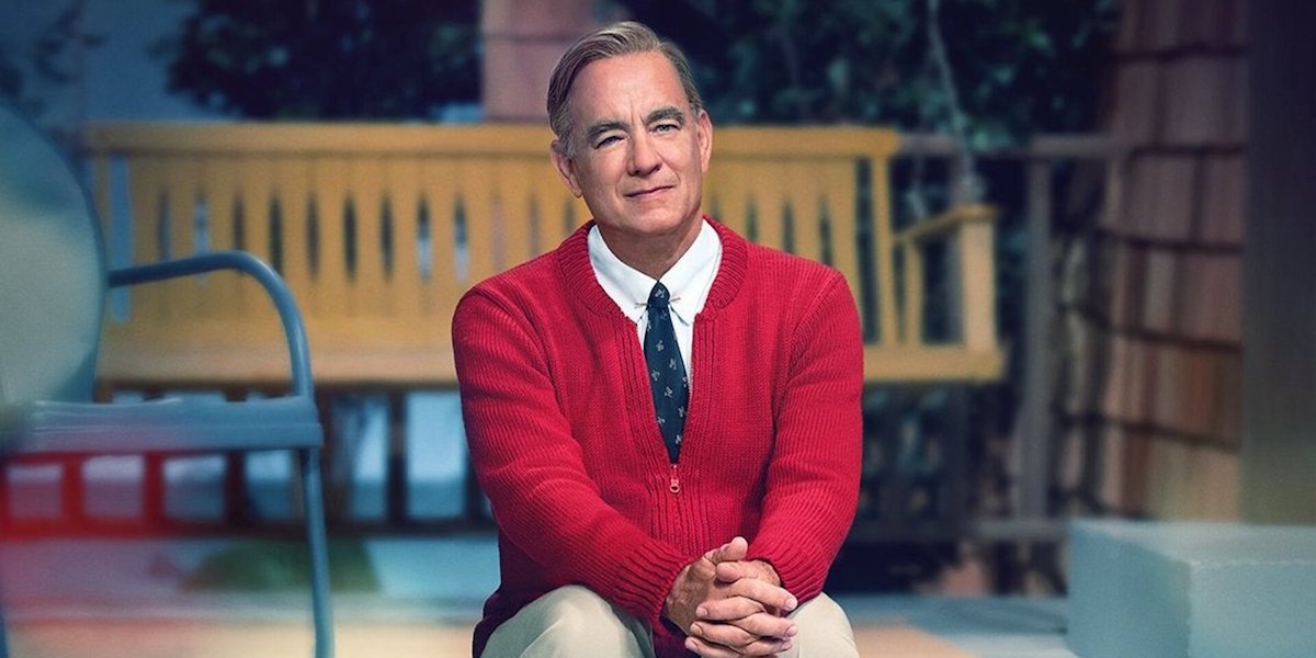 Fred Rogers (Tom Hanks) sits on his porch in &#039;A Beautiful Day in the Neighborhood&#039;