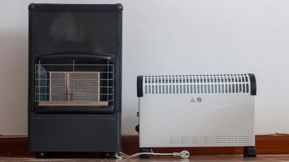 Portable gas heater and electric heater freestanding side by side