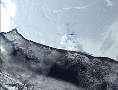 The Ross Ice Shelf is the world's largest ice shelf and an enormous raft-like extension of the West Antarctic Ice Sheet.