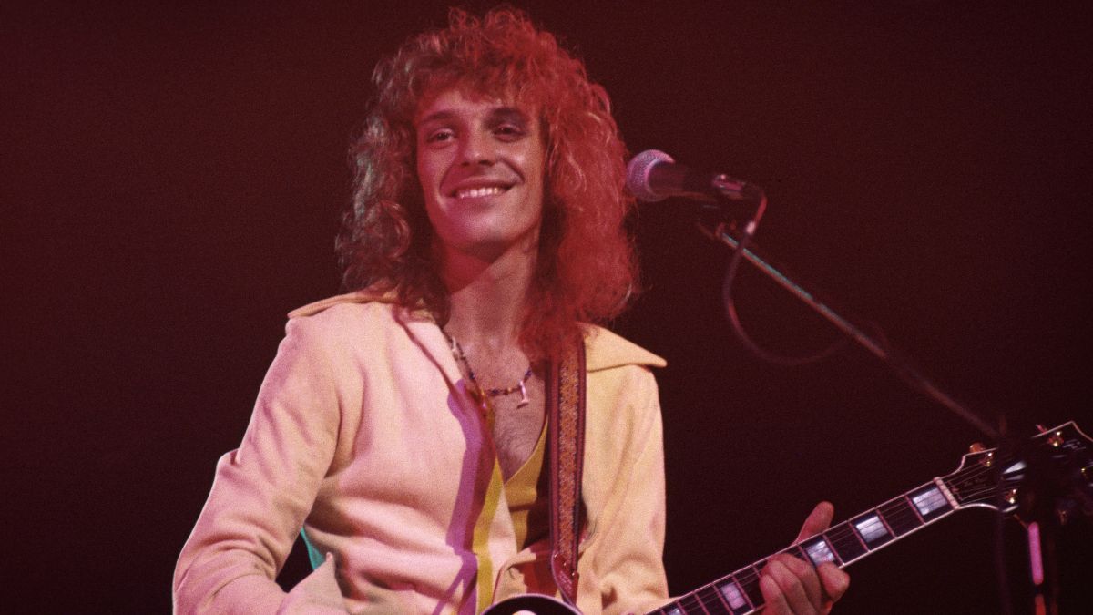 British singer and guitarist, playing a Gibson Les Paul guitar on stage during a live concert performance, circa 1976.