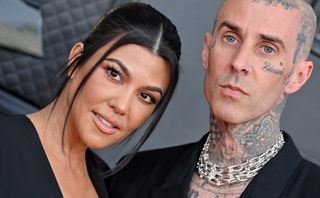When did Travis propose to Kourtney? Kourtney Kardashian and Travis Barker attend the 64th Annual GRAMMY Awards at MGM Grand Garden Arena on April 03, 2022 in Las Vegas, Nevada