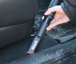 Using the Shark Messmaster Portable Wet/Dry Vacuum to clean a truck