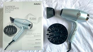 The BaByliss Hydro Fusion hair dryer, attachments and box
