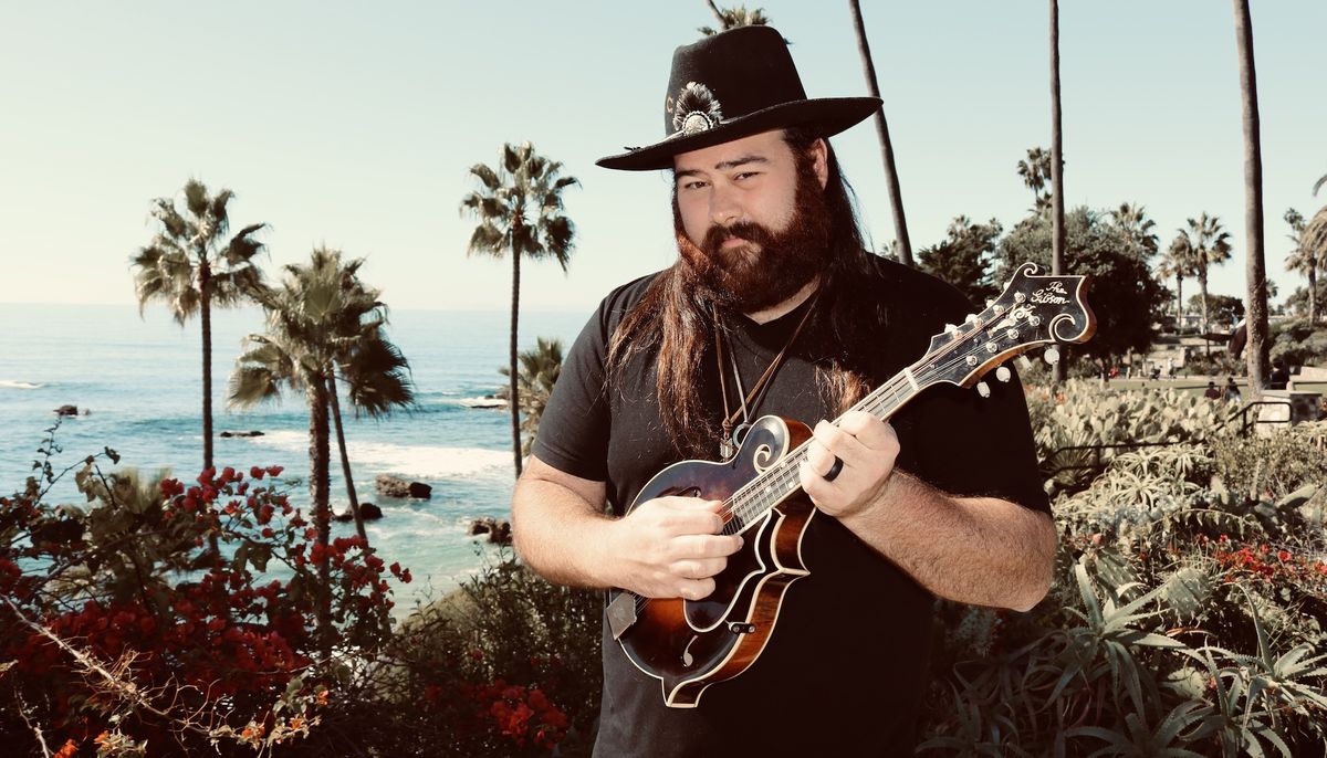 Jack Ryan Sullivan, pictured holding a mandolin