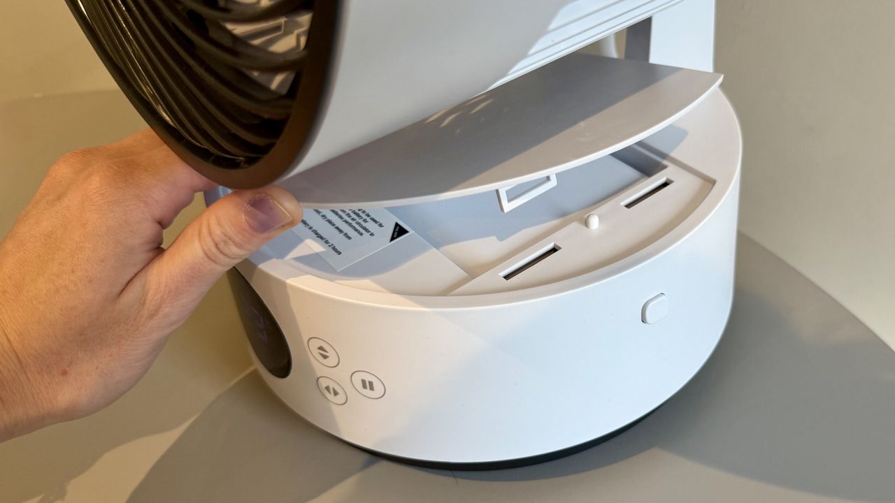 The MeacoFan Sefte Pro 10" Table Air Circulator pictured on a grey table