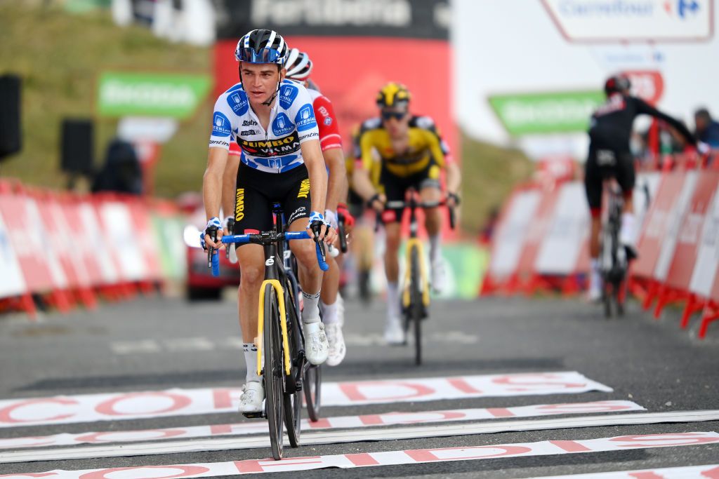 ESPINOSA DE LOS MONTEROS SPAIN AUGUST 16 Sepp Kuss of United States and Team Jumbo Visma polka dot mountain jersey crosses the finishing line in the 76th Tour of Spain 2021 Stage 3 a 2028km stage from Santo Domingo de Silos to Espinosa de los Monteros Picn Blanco 1485m lavuelta LaVuelta21 CapitalMundialdelCiclismo on August 16 2021 in Espinosa de los Monteros Spain Photo by Stuart FranklinGetty Images