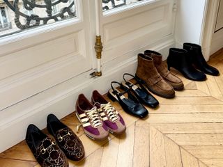 Natalie Cantell shares a line-up of her fall and winter footwear picks from Paris, including her soft Gucci loafers, T-bar patent leather slingbacks, brown suede flat loafer boots, round-toe kitten-heel black boots, and retro Adidas sneakers.