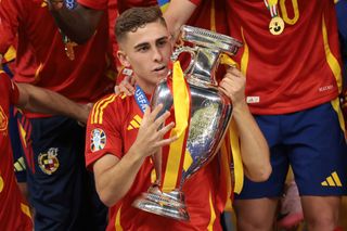 Spain 2024 Olympics squad Fermin Lopez of Spain celebrates with the Henri Delaunay Cup following the victory folloiwngt he 2-1 victory in the UEFA EURO 2024 final match between Spain and England at Olympiastadion on July 14, 2024 in Berlin, Germany. (Photo by Jonathan Moscrop/Getty Images)