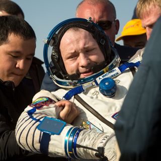 Expedition 36 Alexander Misurkin Carried From Soyuz