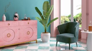 interior trend led living room w ith turquoise walls patterned tiles floors and pink furniture