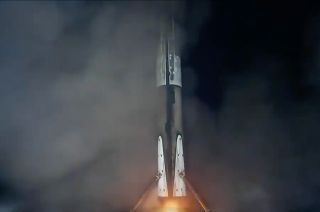 A SpaceX Falcon 9 rocket's first stage lands on the droneship "A Shortfall of Gravitas" in the Atlantic Ocean on Monday, Dec. 18, 2023.