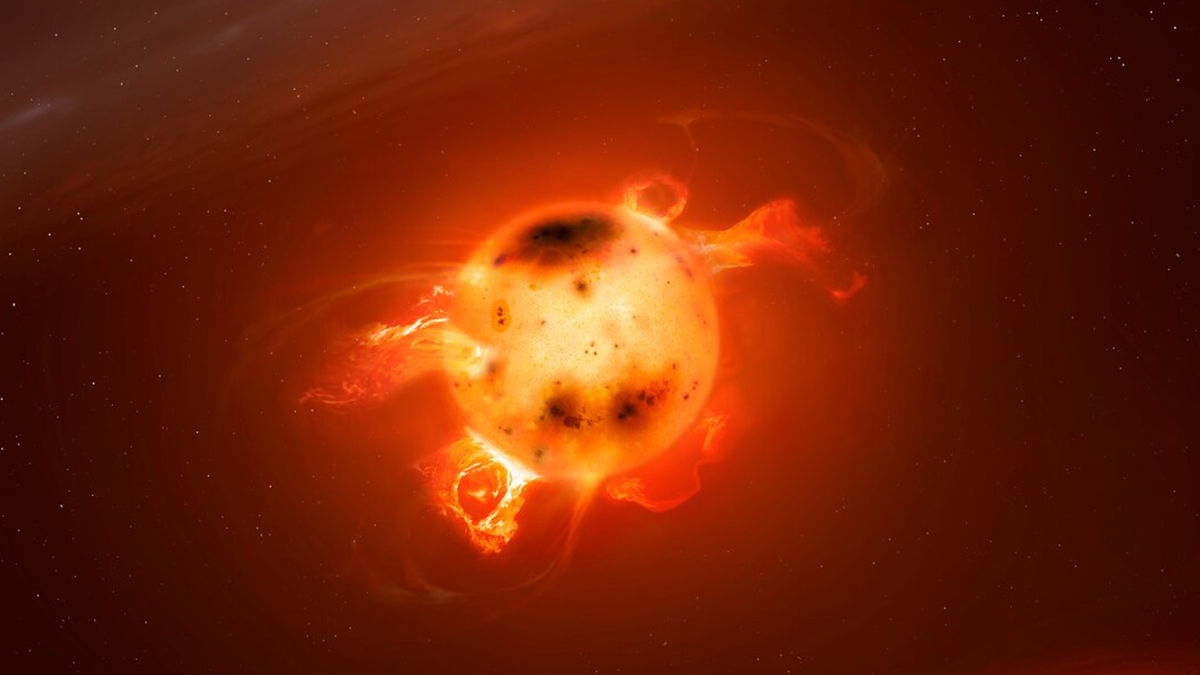 An illustration shows a small star bursting with activity, including sunspots and flares caused by magnetic fields.