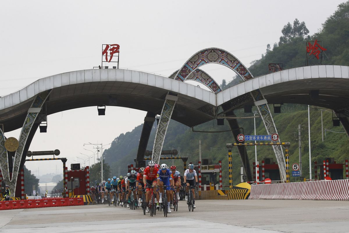 The Tour of Guangxi passes under a toll booth