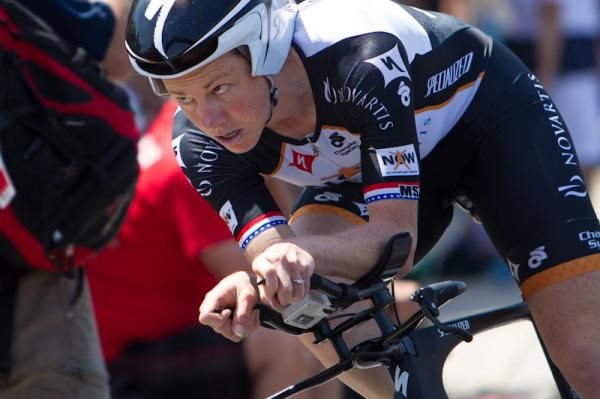 Alison Powers (NOW and Novartis) leans through the first turn.