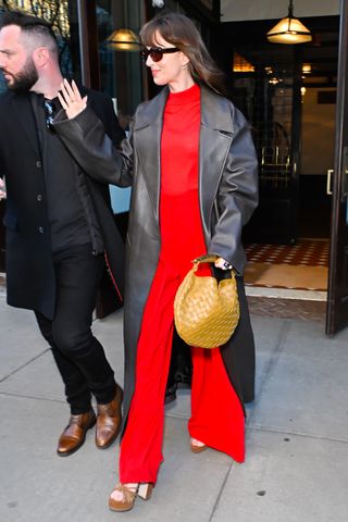 Dakota Johnson Madame Web Bottega Veneta bag platform heels red color trend