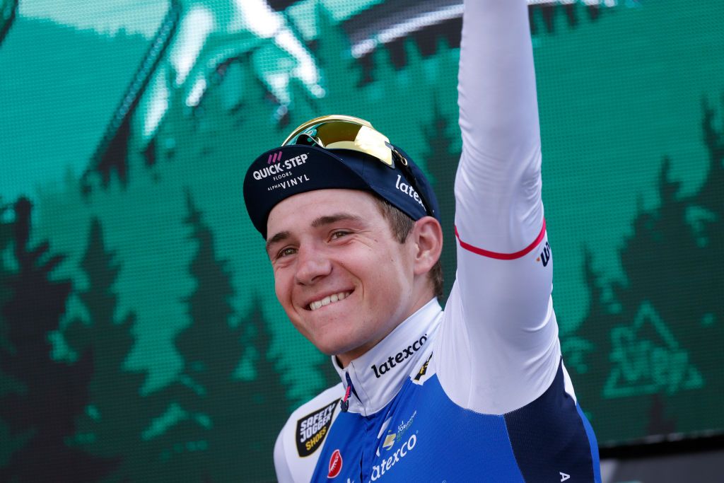 Remco Evenepoel on the podium after winning Liege-Bastogne-Liege