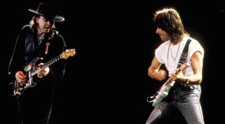 Stevie Ray Vaughan (left) and Jeff Beck perform live onstage in 1989