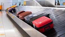 Luggage on an airport conveyor belt.