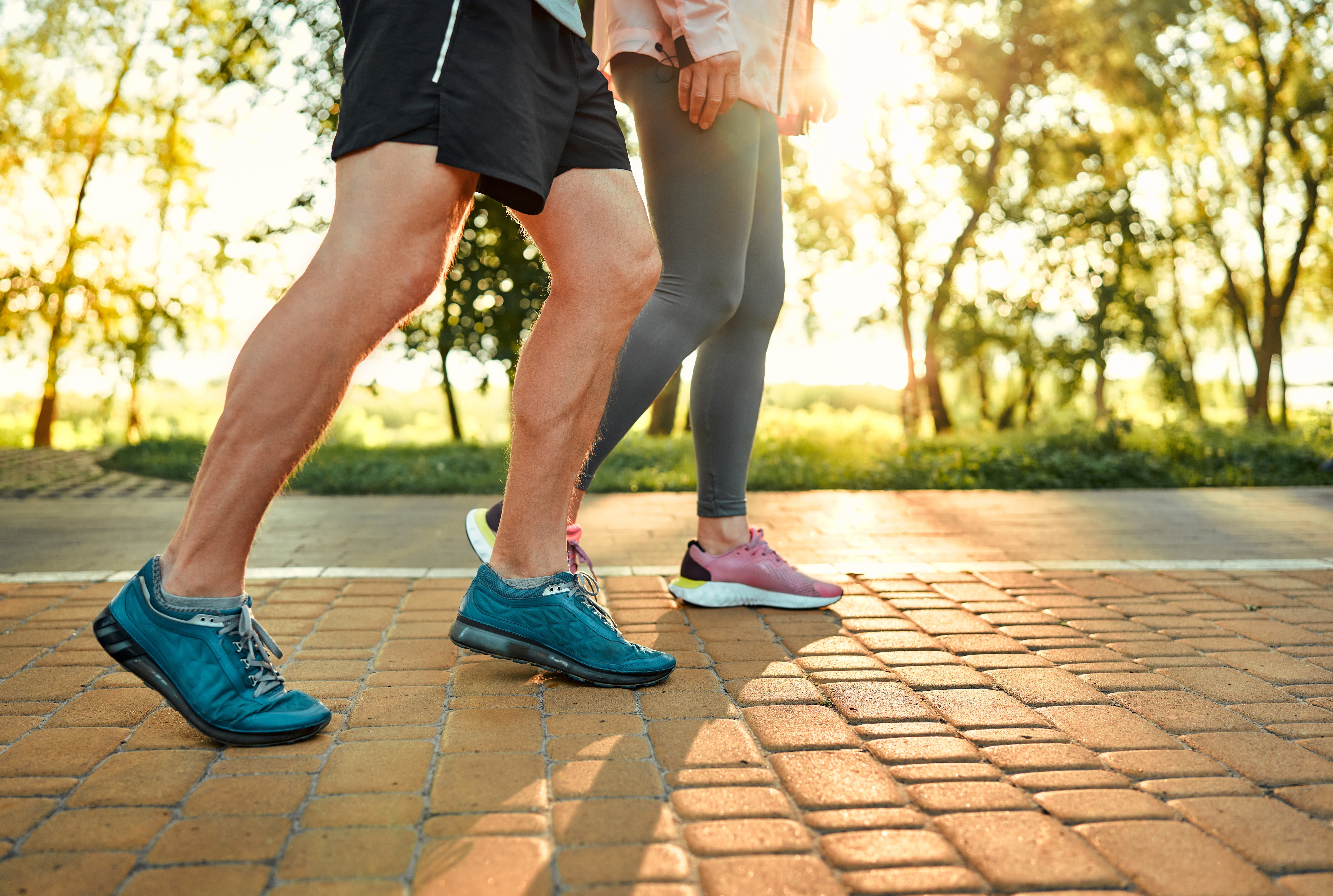 a man and woman walking 