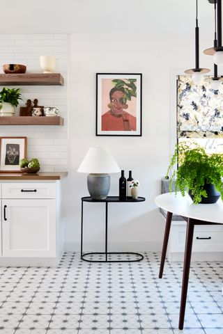 white kitchen with open shelving and artwork by LH Designs