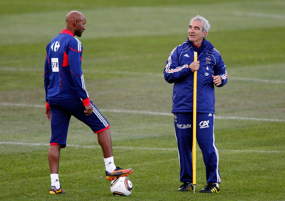 France's Nicolas Anelka and manager Raymond Domenech during a 2010 World Cup training session in South Africa