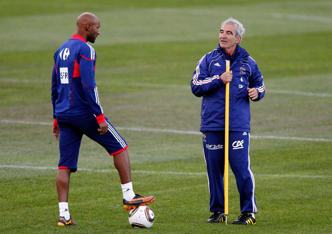 France's Nicolas Anelka and manager Raymond Domenech during a 2010 World Cup training session in South Africa