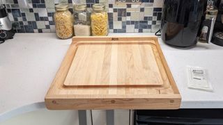 Wooden board with juice grooves