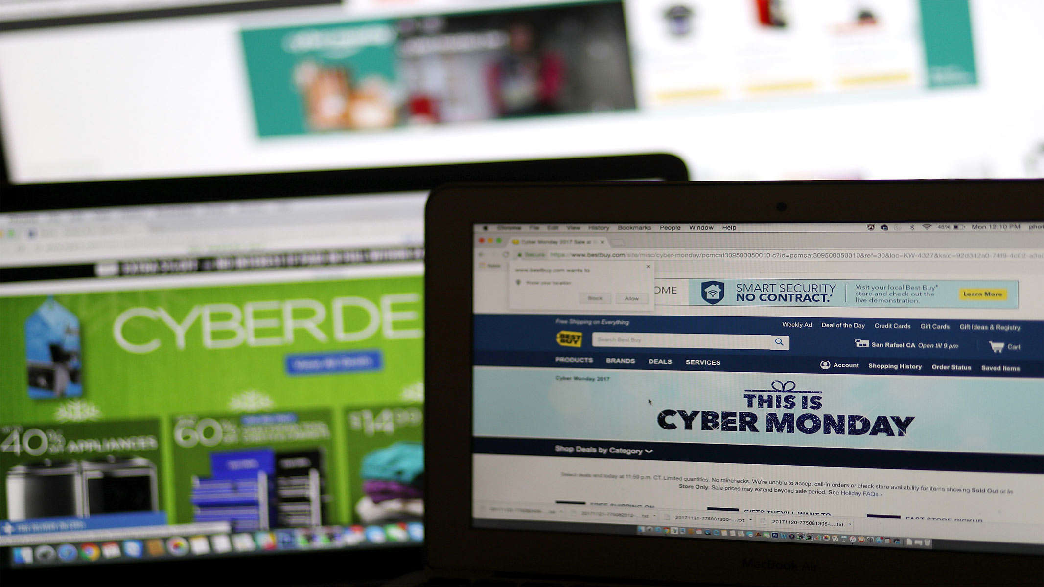 Image shows a Cyber Monday banner on a website on the screen of a laptop computer