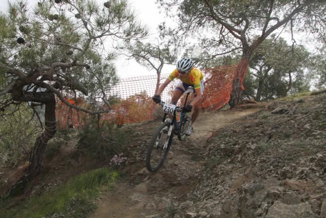 Marianne Vos races downhill toward victory
