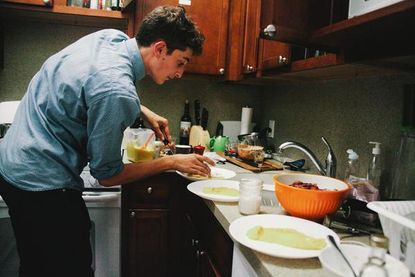 Jonah Reider prepares a meal.