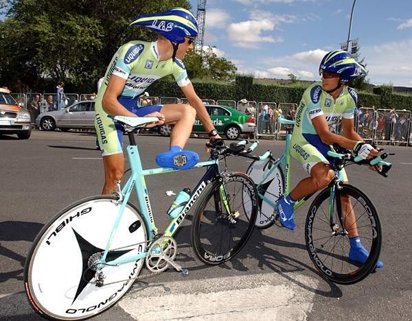 Marcus Ljungqvist and Devis Miorin stretch before the start