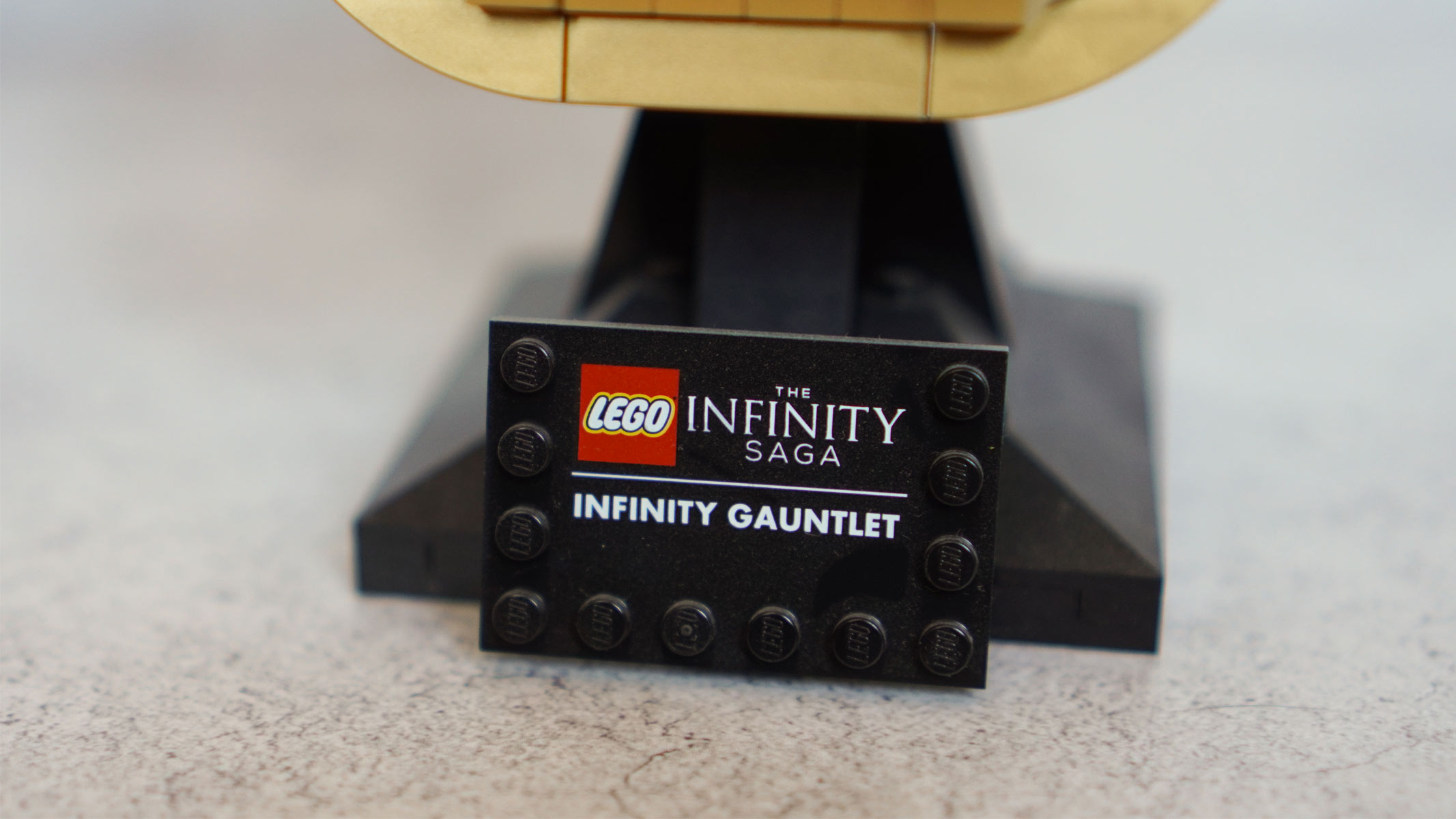 A black display plaque features the Lego logo and reads 