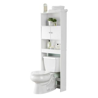 An over toilet storage unit with decor on it