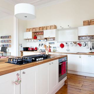 kitchen with wooden floor and crockery shelf