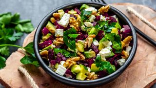 A colourful salad filled with walnuts