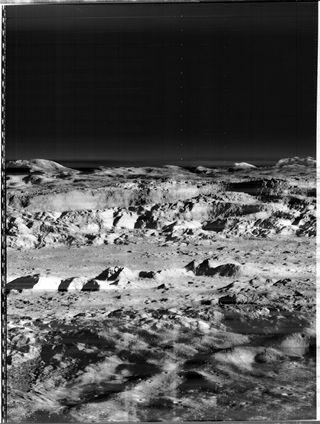 NASA's Lunar Orbiter 2 was an unmanned imaging spacecraft used in 1966 to aid with Apollo and Surveyor landing site selection. The spacecraft became famous in 1967 with the public release of this oblique image of the Copernicus crater (one of only four obliques collected), which was hailed as the "Picture of the Century" by the news media of the day.
