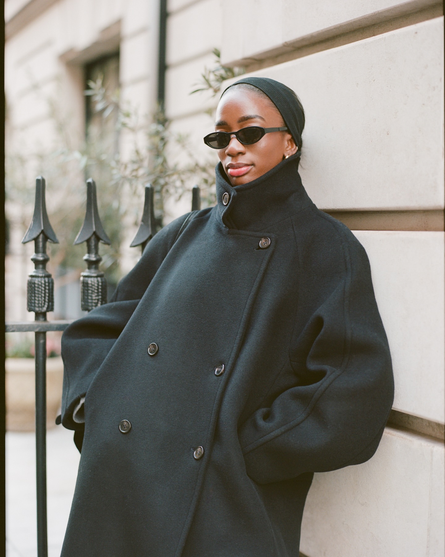 Liv wearing funnel neck coat